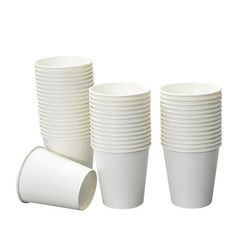 a stack of white cups sitting next to each other