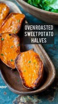 baked sweet potato halves on a plate with lettuce in the background and text overlay