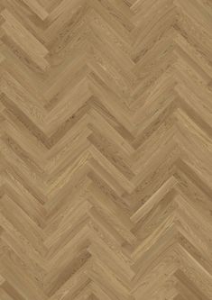 an image of wood flooring that looks like chevroned herringbones in light brown