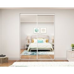 an image of a bedroom with mirrored closet doors