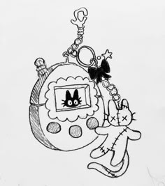 a black and white drawing of a keychain with a cat hanging from it