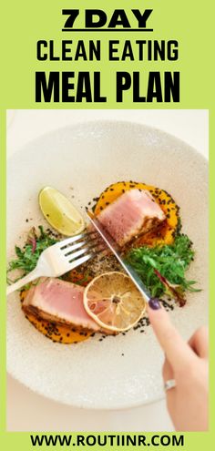 a white plate topped with meat and lemons next to a hand holding a fork