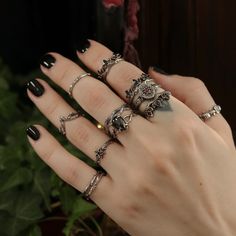 Dark Silver Rings, Dark Feminine Rings, Many Rings On Hand Aesthetic, Gothic Accessories Aesthetic, Gothic Rings Aesthetic, Goth Rings Aesthetic, Rings On All Fingers, Hands With Rings Aesthetic, Chunky Silver Rings Aesthetic