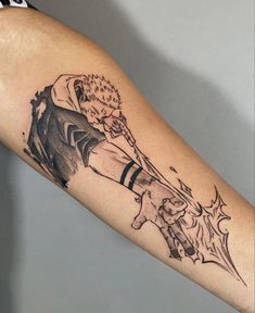 a person with a tattoo on their arm