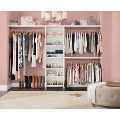 an organized closet with clothes, shoes and other items on shelves in front of a pink wall