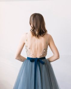 This a fancy tulle wedding skirt with a long train, elegant and airy. The skirt consists of several layers of silk, chiffon, and tulle. It is fastened on the back with a concealed zipper and velvet belt. If you want to change any detail in the style of the wedding skirt, just email us. We will discuss everything and make a custom skirt for you. All our skirt are made to order. Rush orders: Please contact us if your situation requires shorter production times; we will do our best to help you. Siz Dark Blue Wedding Dress, Silk Bridal Gown, Bridal Bow, Buy Wedding Dress Online, Dark Blue Wedding, Tulle Wedding Skirt, Blue Wedding Dress, Wedding Dress Tulle, Velvet Belt