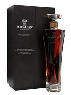 a bottle of macallan selection whisky in front of a black box with the label on it