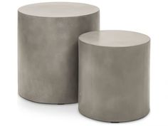 two concrete stools sitting next to each other