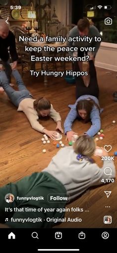 people are playing with candy on the floor in front of a tv screen that reads need a family activity to keep the peace over easter weekend? try hungry hippos