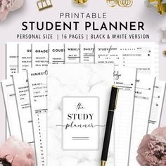 the study planner is shown with pink flowers and gold accents on it, along with other items