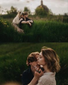 two people are sitting in the grass and one is talking on a cell phone while the other looks at her