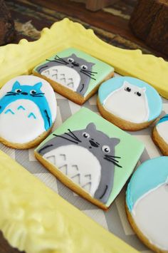 decorated cookies in the shape of cartoon characters