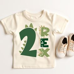 a pair of shoes and a t - shirt with the number two printed on it