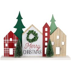 a christmas scene made out of wood and painted red, green and white with the words merry christmas on it