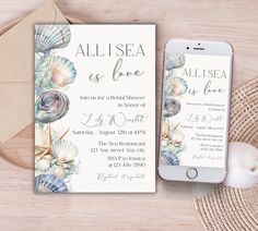 an all i sea is love wedding card with seashells on it