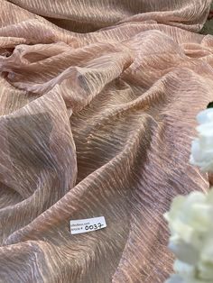 "Article: 0037 content: silk 18% / metallic yarn 82% full width- 44-45\" finished width : 37\"-38\" length: one full yard. weight: silk sheer description: silk tissue pleated fabrics are known for their luster, fine finish, and transparent look. this fine silk sheer fabric is woven with white/copper combination, original width of the fabric 45\" wide after pleated, finished width approximately 37-38\". silk tissue pleated or crushed is a silk sheer, lightweight. this fabric is a blended fabric w Luxury Slub Silk Dupatta For Puja, Luxury Multicolor Tissue Silk Set, Luxury Slub Silk Dupatta In Traditional Drape, Luxury Slub Silk Dupatta For Celebration, Luxury Sheer Dupatta Embroidered Dola Silk Fabric, Luxury Silk Fabric For Festive Occasions, Tissue Fabric, Bridal Anklet, Anarkali Dress Pattern