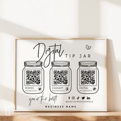 three jars with qr - code on them are displayed in front of a white wall