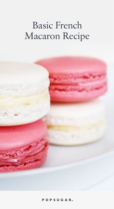 three pink and white macarons on a plate with the words basic french macaron recipe