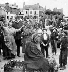 a group of people standing around each other