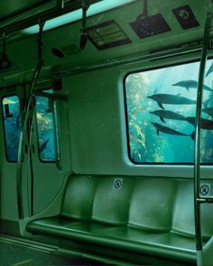 an aquarium is seen through the window of a train