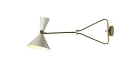 a wall light with a white shade on the side and a metal arm that is attached to it