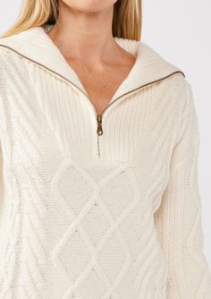 A bohemian off-white cable knit sweater. Cable knit Relaxed fit Long sleeve Dropped shoulder Ribbed sleeves and hem Half zipper placket Bohemian fall sweater Hand wash cold Ready to bundle up in effortless cozy this season? Our chunky cable knit sweater has you covered! With its half-zip front, long sleeves, and relaxed fit, this luxurious throw-on-and-go piece is as comfy as it is stylish. Layer it over your favorite basics for extra warmth, and take on Fall in style, whether you're heading to Early Morning Coffee, White Cable Knit Sweater, Zipper Placket, Chunky Cable Knit Sweater, Bohemian Fall, Coffee Dates, Chunky Cable Knit, Fall Sweater, Cable Knit Sweater