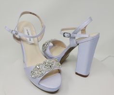 "Lilac Crepe Wedding Shoes with chunky heel and front platform, featuring a sparkling crystal applique. The listing picture shoes the shoes dyed Lilac. They have an approximate 4.25 inch heel. These beautiful bridal shoes are available in over 100 different colors including white, ivory, eggplant, David's Bridal Colors, as well as the option of sending us a sample swatch to color match for you! * All dyed shoes can bleed when exposed to moisture. If you would like to protect your shoes please co Wedding Shoes Purple, Dyed Shoes, Platform Bridal Shoes, Block Heel Wedding Shoes, Platform Wedding Shoes, Bridal Colors, Royal Blue Heels, Purple Wedding Shoes, Blue Bridal Shoes