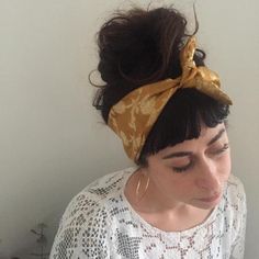 ♡Golden Sunshine Head Scarf♡Pretty handmade head scarf created from crepe silk fabric with gold thread.We always use vintage fabrics to make these lovely head scarves...please note that the pattern on each one might differ slightly to the one pictured!♡All of our designs are created by a very small team in the seaside town of Brighton, UK. Most of our items are one of a kind, often created from limited pieces or runs of vintage fabrics.♡Our fabrics are sourced from a wide range of places and we Hairstyles Head Scarfs, Handkerchief Hairstyles, Scarf Updo, Boho Head Scarf, Hair Kerchief, Kerchief Hair, Scarf Head Wrap, Silk Head Scarf, Head Scarfs