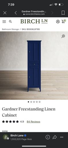 a blue cabinet sitting on top of a wooden floor