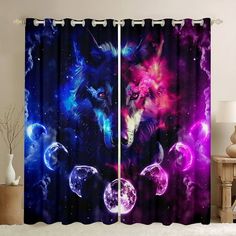 two curtains with wolfs and planets on them