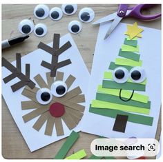 paper plate christmas tree with eyes and nose cut out to make it look like a reindeer