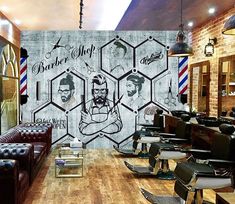 the barber shop is decorated with wallpaper and leather furniture, along with two men's haircuts