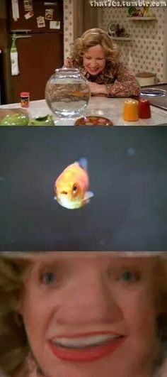 a woman with a fish bowl on her head in front of the camera and an image of a goldfish