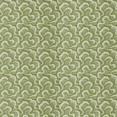 a green and white wallpaper with swirly designs on it's surface,