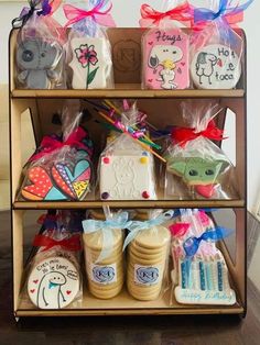 a wooden shelf filled with lots of different items