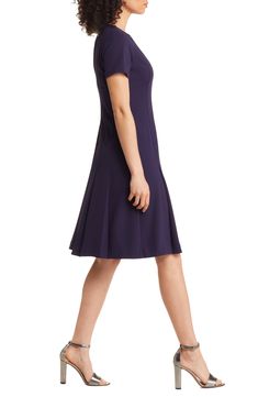 Desk days and drinks dates both work well with this soft crepe dress designed in everybody's favorite fit-and-flare silhouette. 38 1/2" length (size 8) Jewel neck Short sleeves Lined 96% polyester, 4% elastane Dry clean Imported Elegant Fit And Flare Elastane Dress, Elegant Fit And Flare Dresses, Cocktail A-line Elastane Dress, Seamed Midi Length Work Dresses, Seamed Midi Dress For Work, Elastane A-line Cocktail Dress, Elegant A-line Midi Dress, A-line Seamed Dress For Work, Fit And Flare Elastane Formal Dress