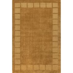 an area rug with squares and rectangles on the bottom, in light brown