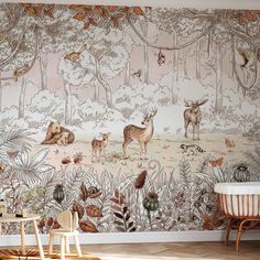 an animal themed wallpaper with deers and other animals in the woods on it