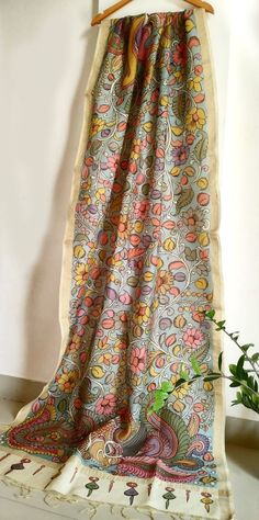 "Hand Painted Silk Kalamkari Dupatta ,Traditional Indian Artwork ,Artisan Crafted Scarf,  long sarong, stoles, shawl, best gift for her. Kalamkari means - Art with the Pen done by hand Kalamkari is done with the ecofriendly vegetable colours. Milk is used in the process in order to get the vegetable colors on the fabric & River washed in flowing water. We are trying to preserve this age old tradition by giving handful work to weavers, and we want you to become part of this initiative by buying h Luxury Handloom Traditional Drape Shawl, Luxury Handloom Tussar Silk Traditional Wear, Luxury Tussar Silk Shawl Dupatta, Luxury Batik Print Dupatta, Multicolor Cotton Dupatta With Digital Prints, Artistic Silk Dupatta With Traditional Drape, Artistic Handloom Chanderi Dupatta, Bohemian Multicolor Shawl With Printed Border, Traditional Multicolor Block Print Shawl