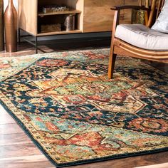 a living room area with a chair and rug