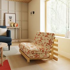 a living room filled with furniture next to a large window covered in wood planks