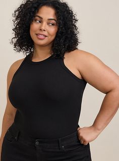 FIT Model is 5'10” wearing size 2. . Measures 30” from shoulder (size 2). . MATERIALS + CARE Super Soft Rib knit fabric. 59% polyester, 31% rayon, 10% spandex. . Machine wash cold. Dry low or flat. . Imported. . DETAILS Scoop neck. . Sleeveless. . The best plus size women's super soft rib high neck tank top sleeveless & tops in deep black made of super soft rib. These dressy clothes and work-wear, office-wear, career-wear, and business-wear will make you look professional to nail your job interv Rib Knit Fabric, High Neck Tank Top, High Neck Tank, Top Plus Size, Career Wear, Sleeveless Tops, Deep Black, Top Sleeveless, Textured Knit