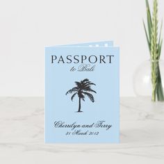 a pink passport with a palm tree on it