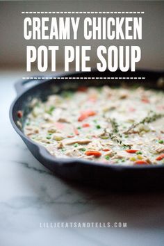 creamy chicken pot pie soup in a cast iron skillet