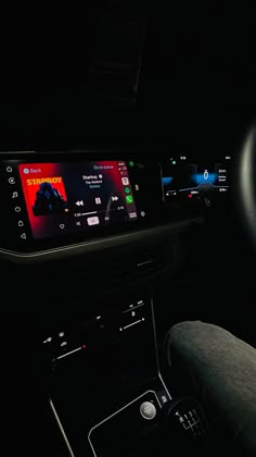 the interior of a car with an entertainment system