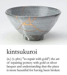 a bowl with some writing on it and an image of the words kintsuuru