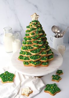 a christmas tree made out of cookies on a plate