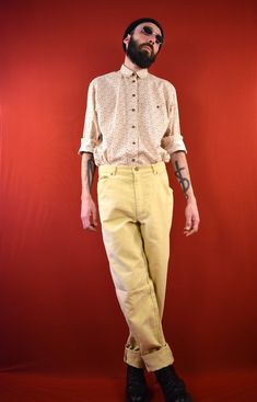 "Very soft and comfy Unisex Vintage Pants from the early 70s by the Brand \"Dribbling\". The pants are made of 100% Cotton. Conditions: New Size on label: 50 Dimensions: Waist: 40cm Inner Leg Length: 85cm Front Rise: 30cm If this item is not automatically shipped to your Country, please get in touch with us! Please check our Shop Policies in the \"About\" section at the bottom of our main shop page: https://www.etsy.com/shop/AntimodeVintage Eco Choice! Buying Vintage items reduces the environmen Vintage Relaxed Fit Pants For Spring, Vintage Spring Pants With Pockets, Vintage Full Length Bottoms For Spring, Retro Style Relaxed Fit Full Length Pants, Retro Full Length Relaxed Fit Pants, Spring Vintage Full Length Pants, Vintage Cotton Pants For Spring, Vintage Wide Leg Yellow Pants, Vintage Cotton Spring Pants