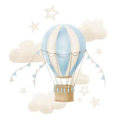 a blue and white hot air balloon floating in the sky with stars on it's sides