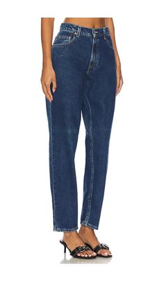 Find ALIGRACE High Rise Slim Customs Straight In Blue on Editorialist. aligrace High Rise Slim Customs Straight in Blue. - size 24 (also in 30, 33, 34) aligrace High Rise Slim Customs Straight in Blue. - size 24 (also in 30, 33, 34) 100% cotton. Made in USA. Machine wash. Zip fly with button closure. 5-pocket design. Light distressing throughout. Due to the use of reclaimed vintage fabrics, details and colors vary throughout to ensure that each piece is uniquely its own.. 19 at the knee narrows Ali Grace, Timeless Wardrobe Staples, Reclaimed Vintage, Design Light, Vintage Fabrics, Pocket Design, The Knee, Perfect Pair, Made In Usa